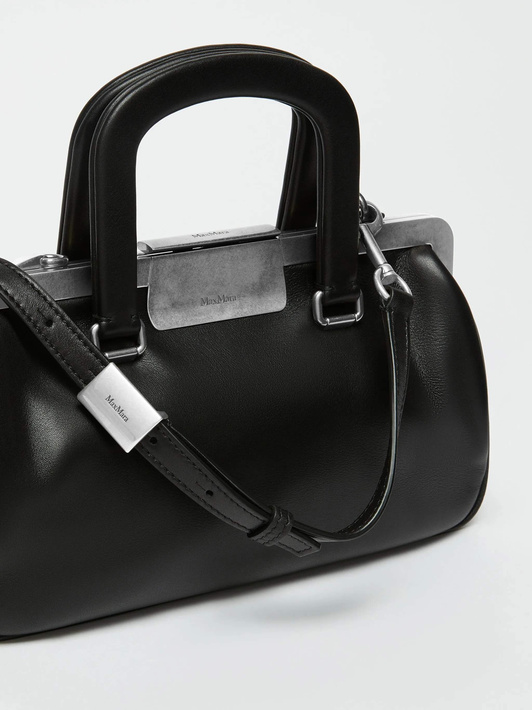 Borsa Clasps a mano small in pelle