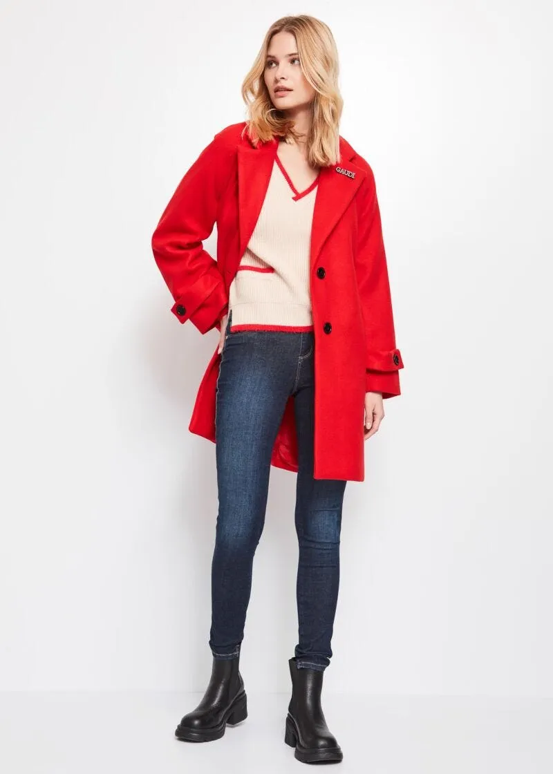 Cappotto con spilla logata