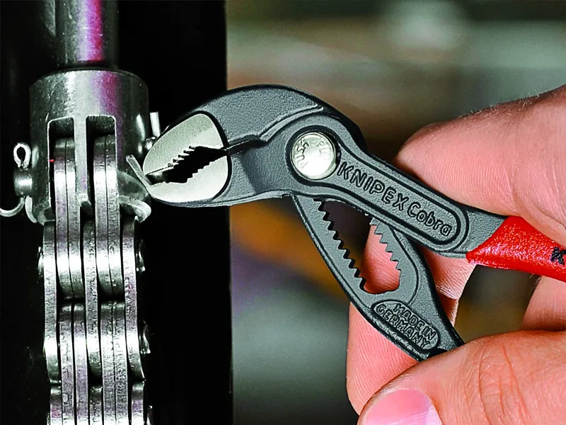Knipex Cobra pinza regolabile per tubi e dadi con anello di fissaggio, 180mm