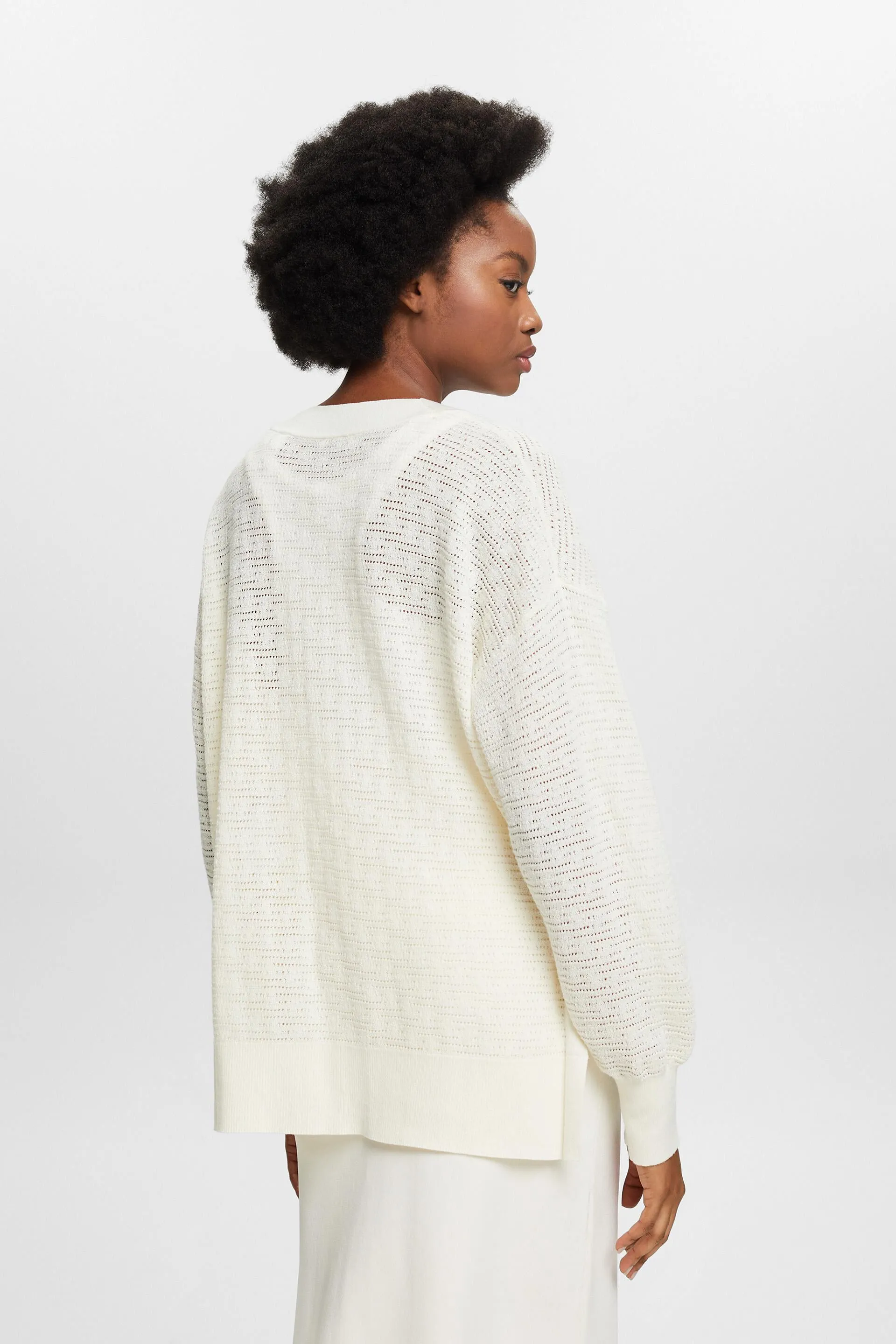 Pullover con lavorazione pointelle e scollo a V
