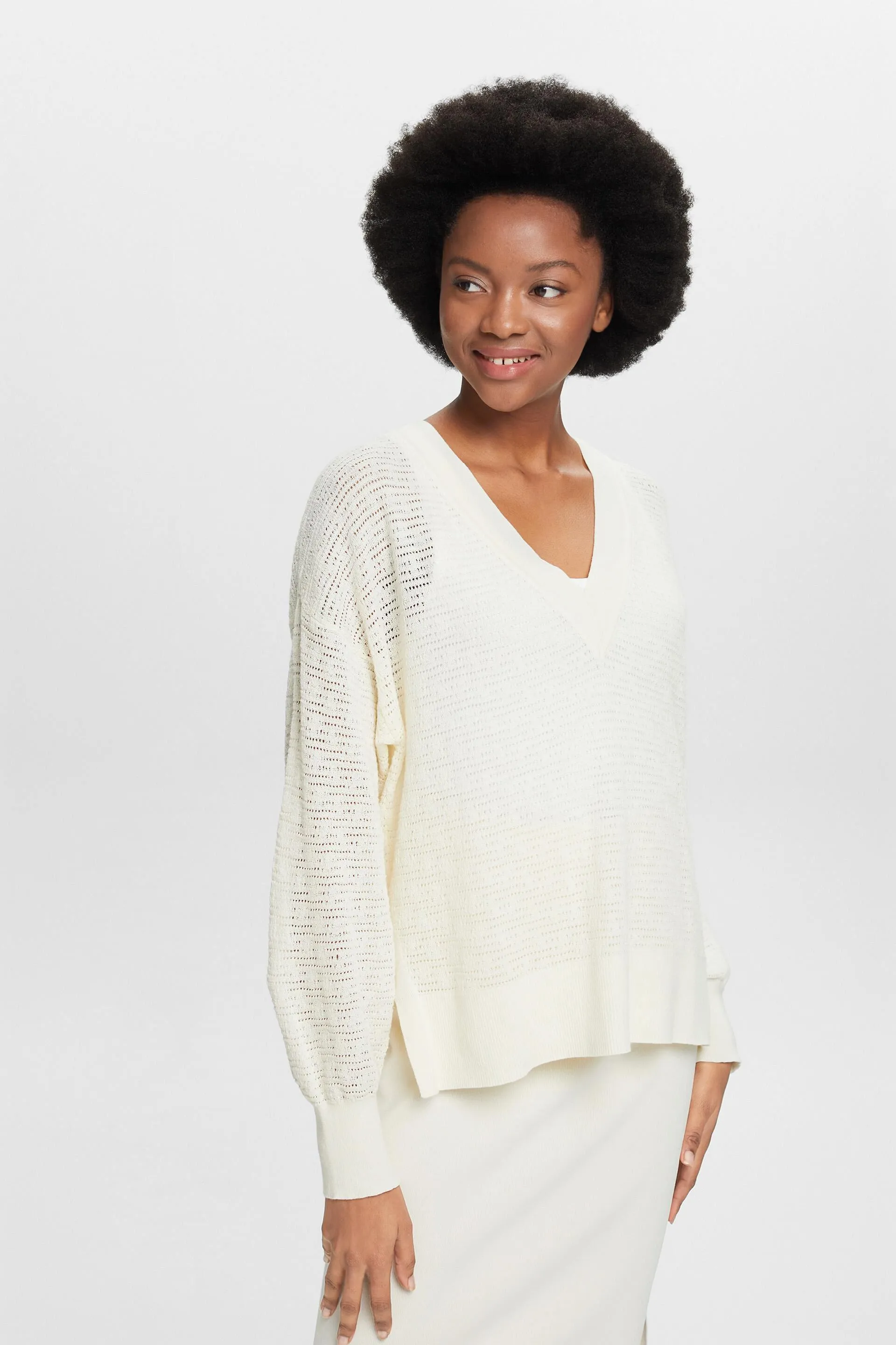 Pullover con lavorazione pointelle e scollo a V